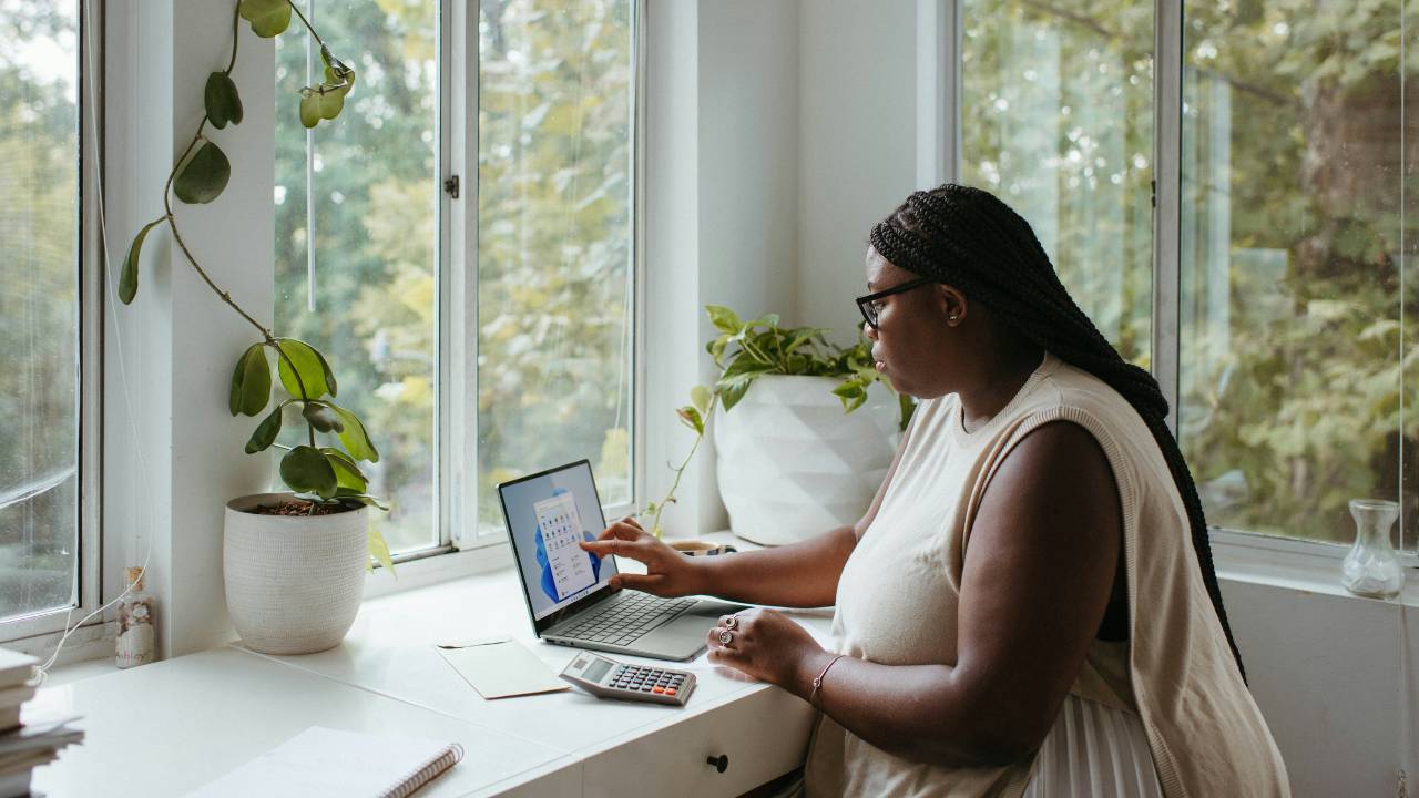 A female remote worker in the comfort of her home